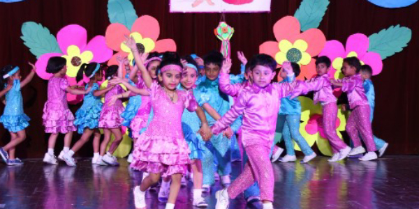 Cute Little Kids Performing On The Stage During Their Annual Day Celebrations.