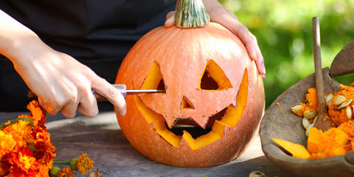 Pumpkin Carving For Halloween Party In Kindergarden