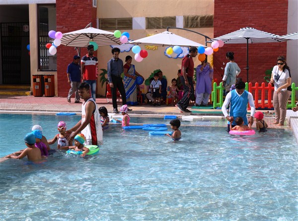 Kids Enjoying In The Pool Party 