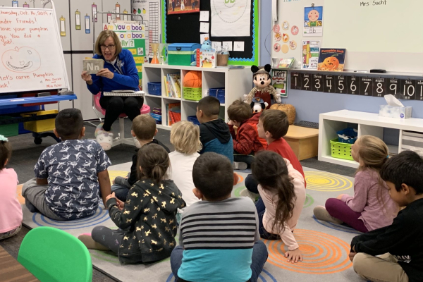 A teacher teaching childrens' in Kindergarten